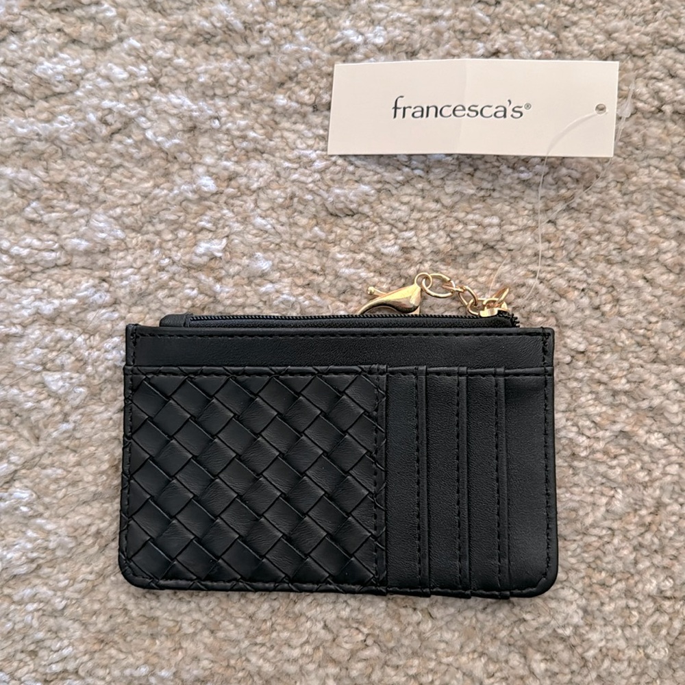 Small black wallet. New with tags.